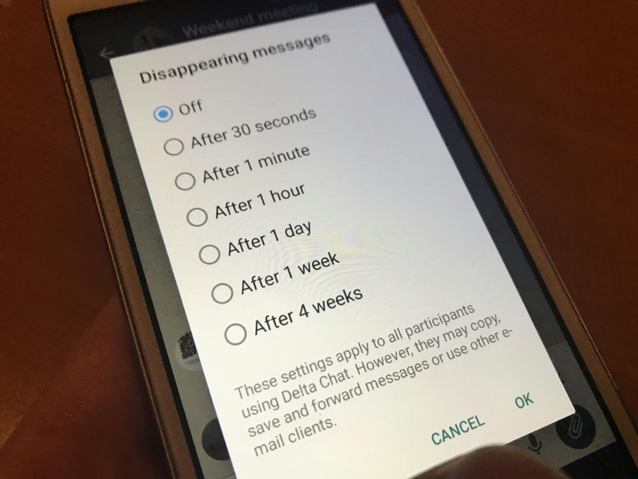 Phone screen showing alternatives for how long messages should be retained.