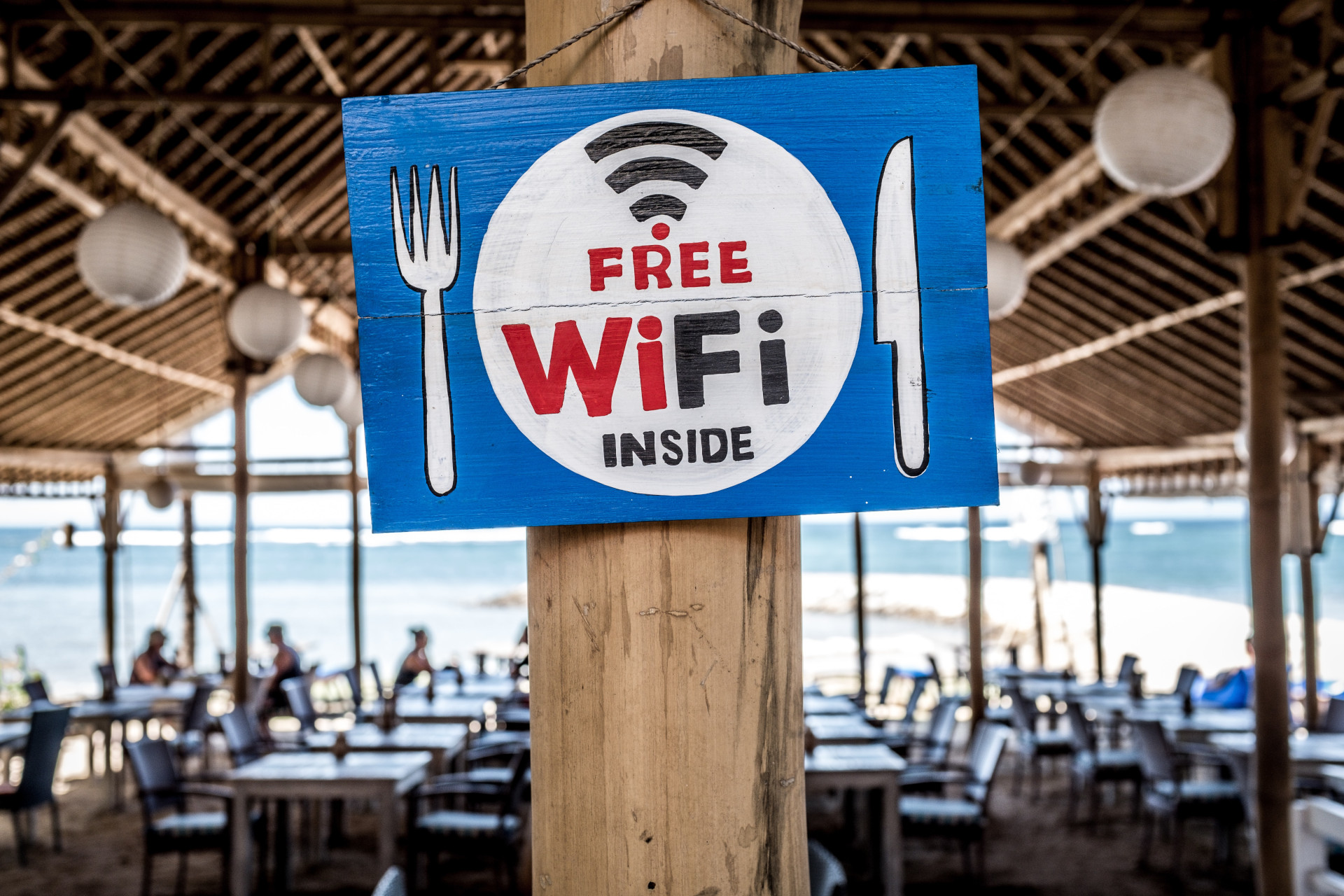 A "free Wi-Fi inside" sign at a restaurant.